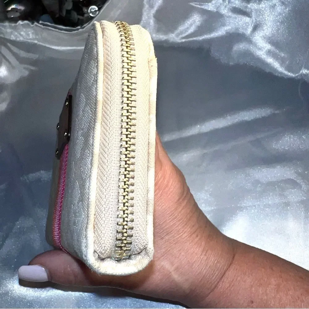 Kate Spade Neda Signature Beige and Pink Stripe Zip Around Wallet